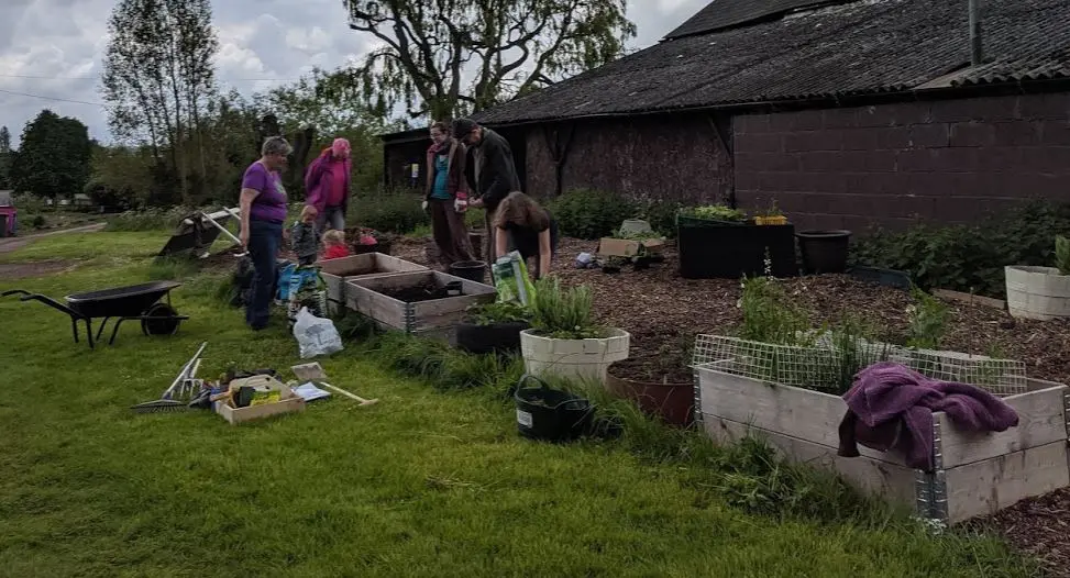 Mucking in with a permablitz in on our permaculture community garden