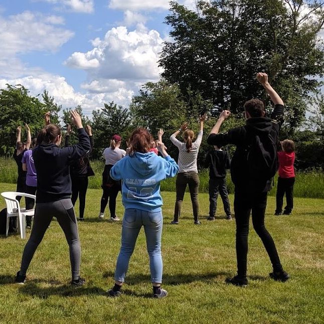 GIV MK kids dance in the garden at WAC