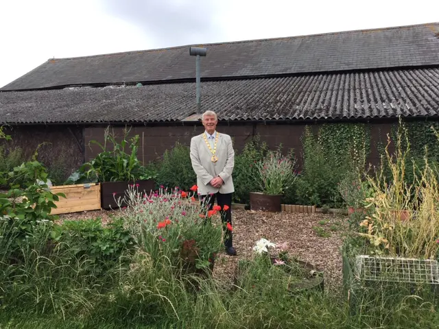 Milton Keynes Mayor, Cllr Sam Crooks in the Planting Up community garden