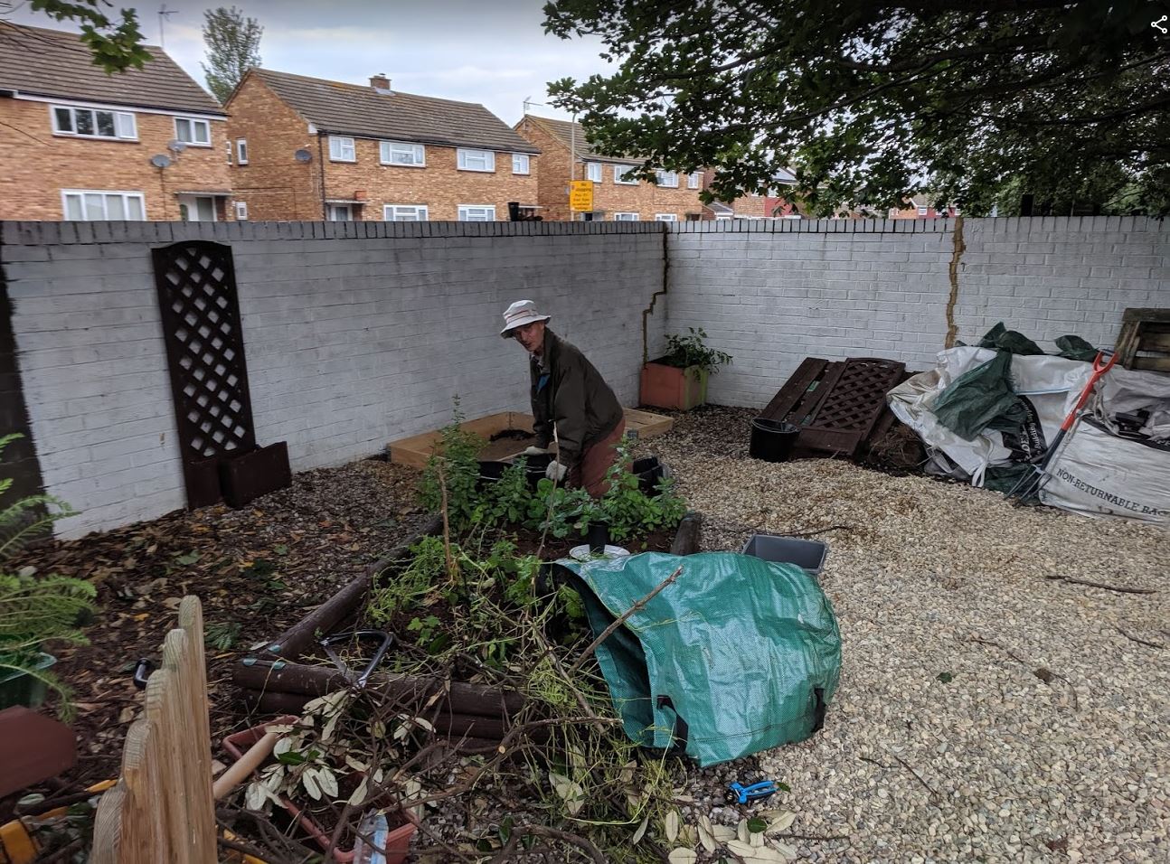 The left side of the Daisychain Family Centre garden - Our volunteers at work