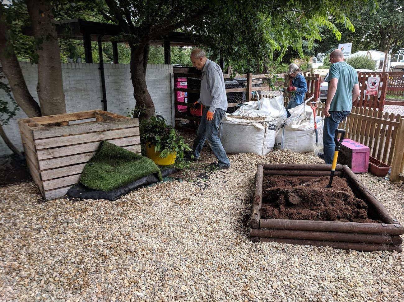 The right side of the Daisychain Family Centre garden - Our volunteers hard at work