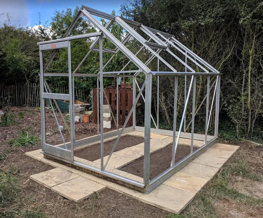 The greenhouse has a new concrete base