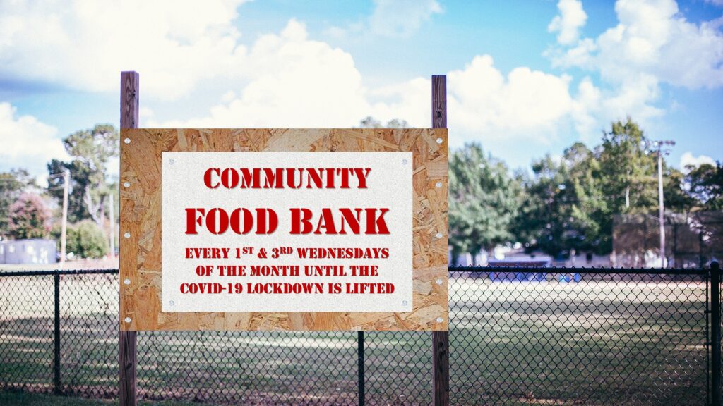 Community food bank sign during the Coronavirus pandemic - Image by Queven from Pixabay