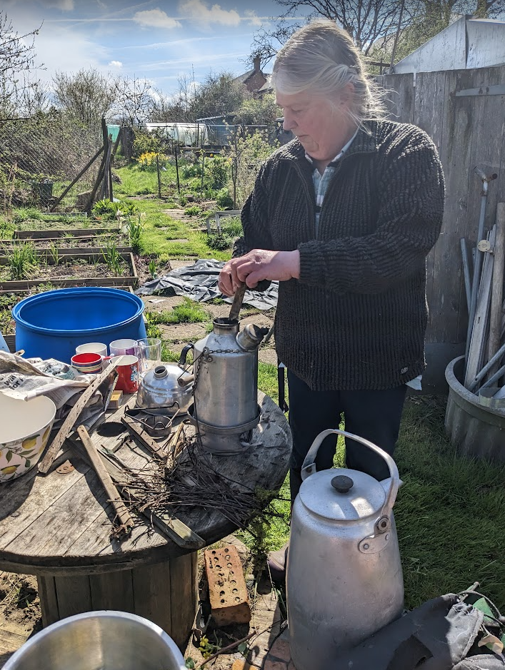 Ruth preparing the ghillie kettle while we source wood for it