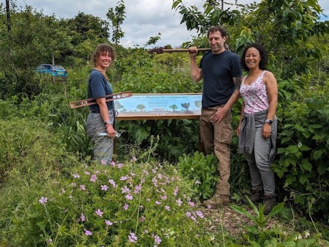 Our sign with our designers and me